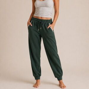 Green lounge pants with track style stripes